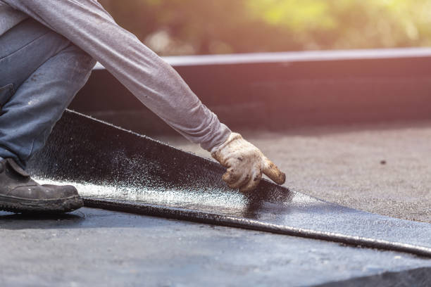 Professional Basement Waterproofing technician working in Berkeley, IL